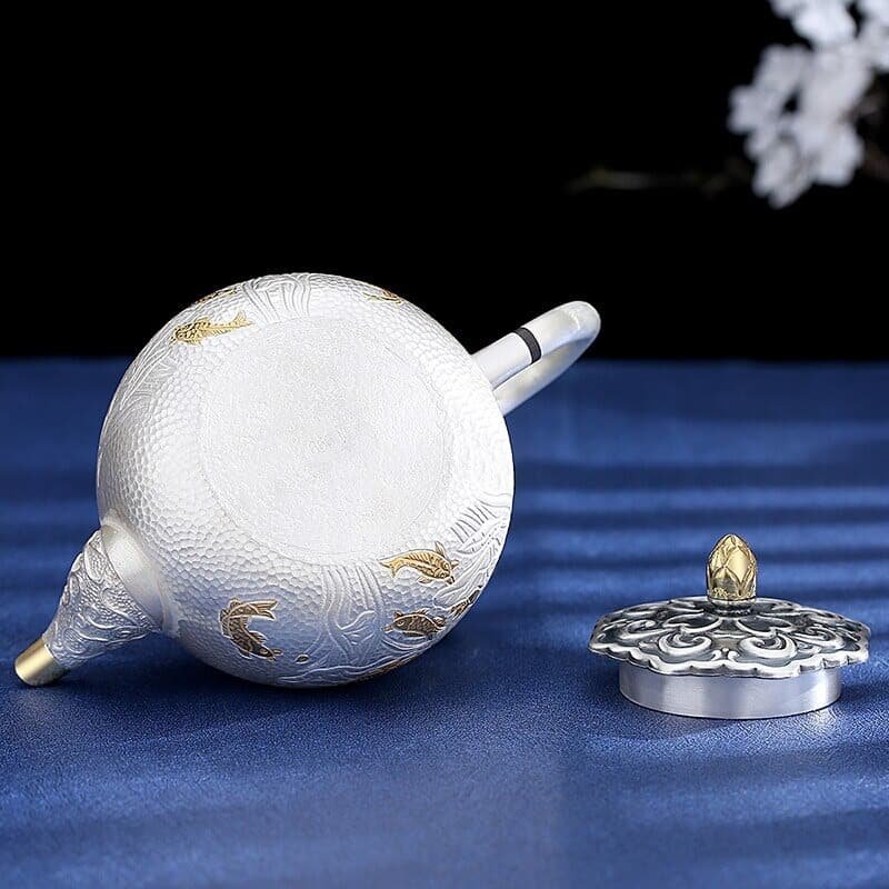 Chinese Silver Teapot With Rose and Lotus bottom view