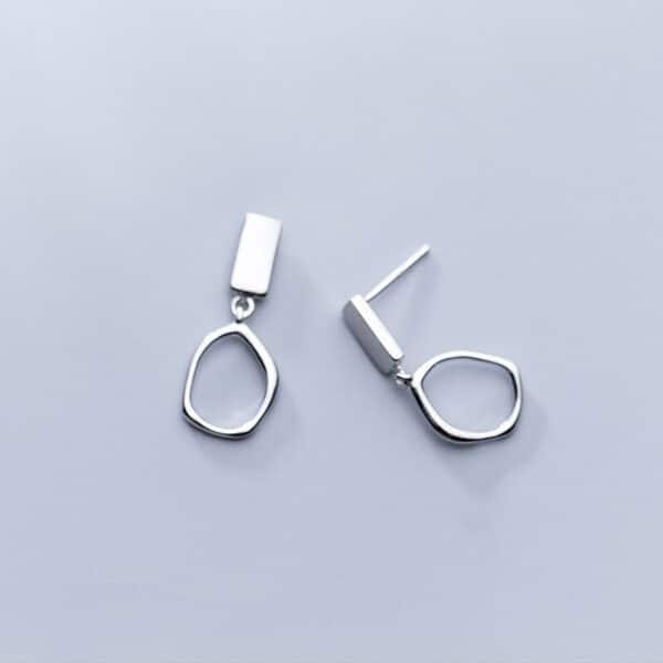 Tiny Sterling Silver Stud Earrings profile view