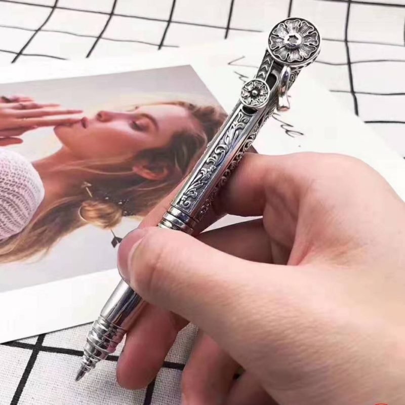 Handmade Sterling Silver Ballpoint Pen in hands
