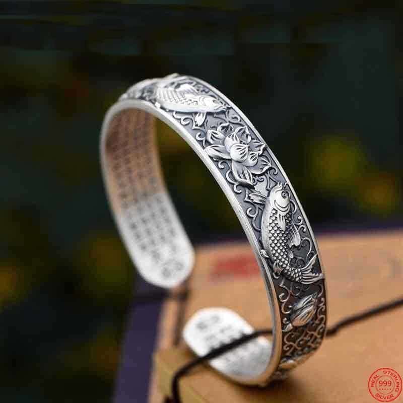 silver bangle bracelet fish details