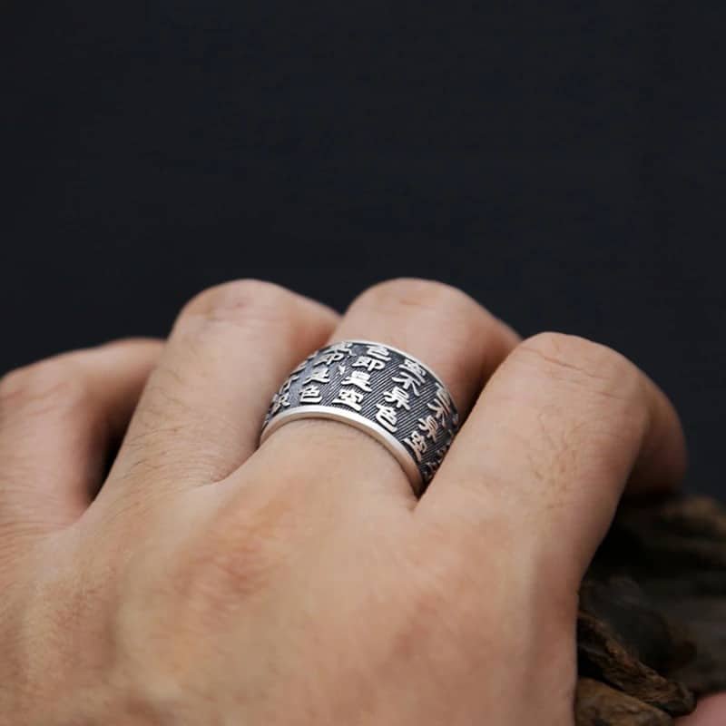 Engraved Buddhist Silver Ring on finger