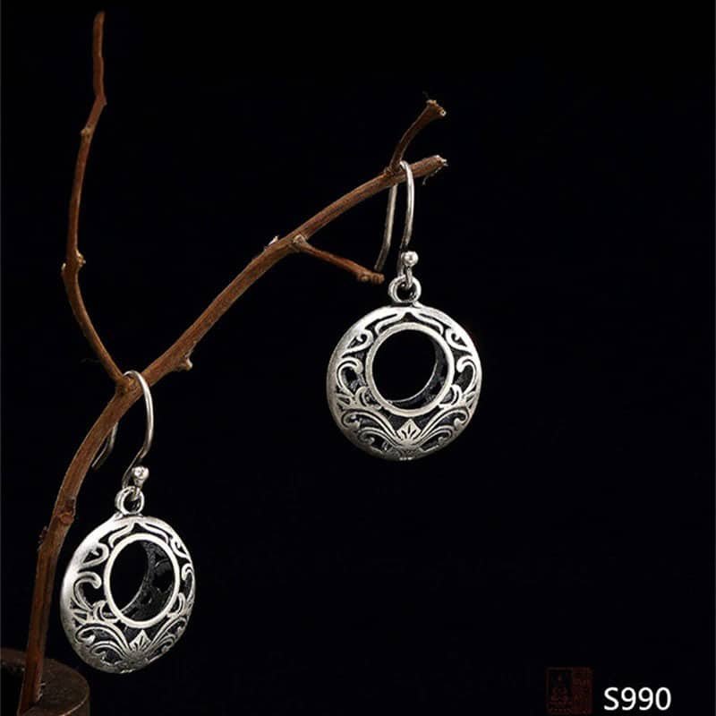 Large Hollow Silver Hoop Earrings face view