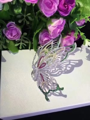 Silver Brooch multicolor butterfly face view
